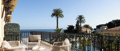 Suite, 1 Bedroom (Sea and Garden) | 1 bedroom, premium bedding, free minibar, in-room safe