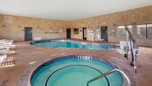 An indoor swimming pool with two lanes, marked depth indicators, and a lifeguard chair. - Comfort Inn & Suites Lubbock West (Lubbock)