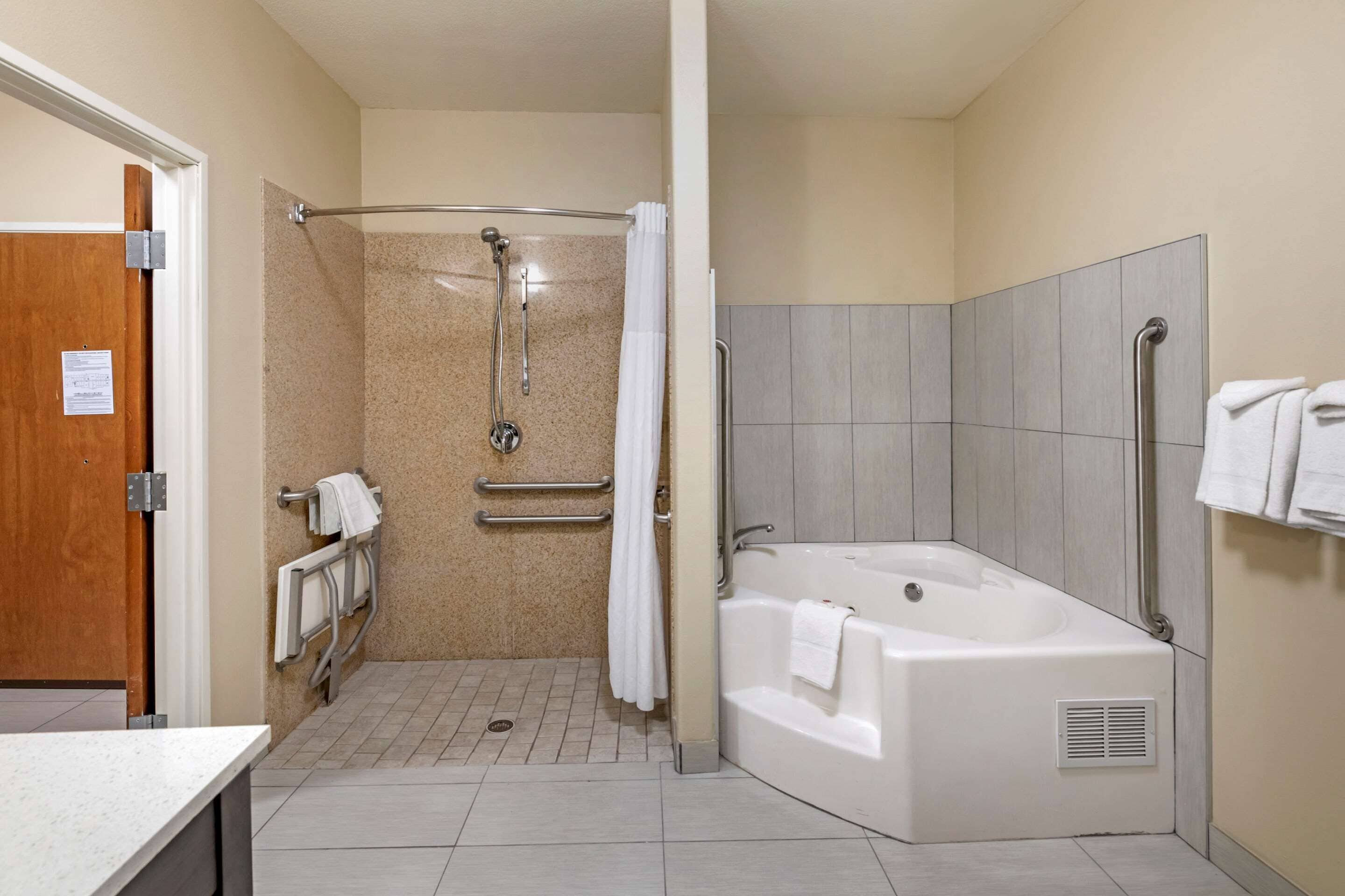 combined shower/bathtub, free toiletries, hair dryer, towels