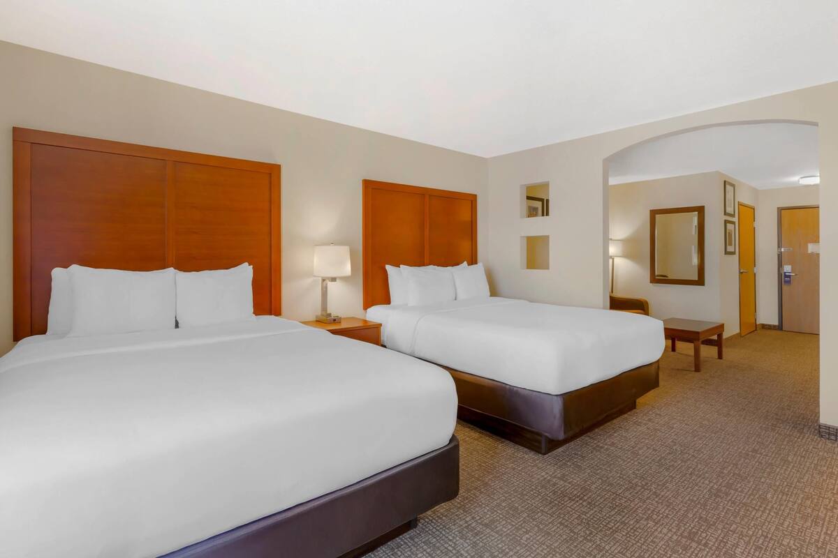 desk, laptop workspace, blackout curtains, iron/ironing board