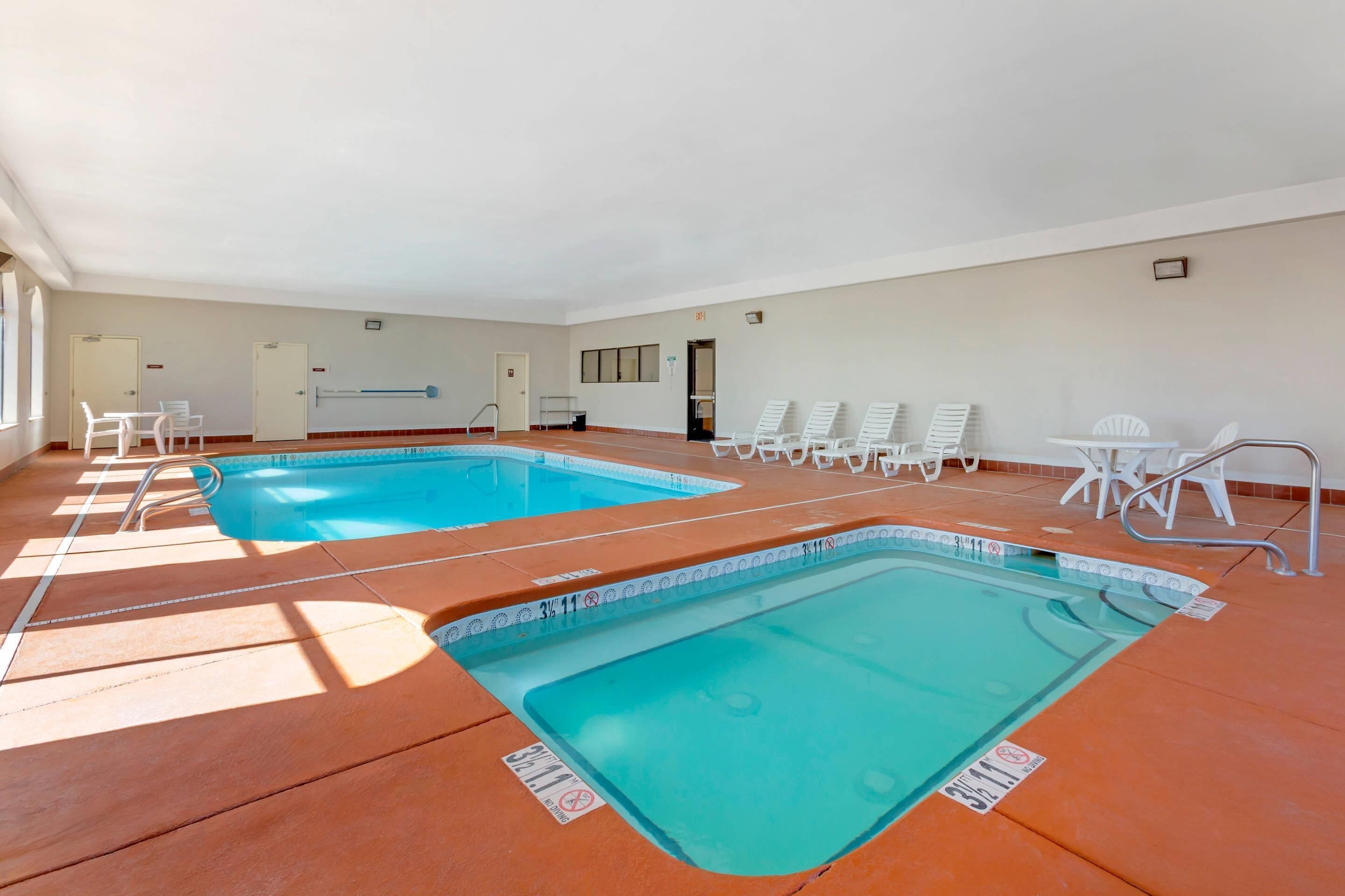 indoor pool, open 9 am to 11 pm, pool loungers