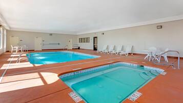 Indoor pool, open 9 AM to 11 PM, pool loungers