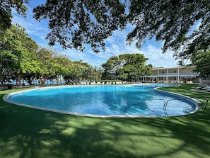 Outdoor pool, pool umbrellas, sun loungers