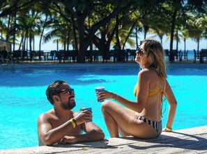 Outdoor pool, pool umbrellas, sun loungers