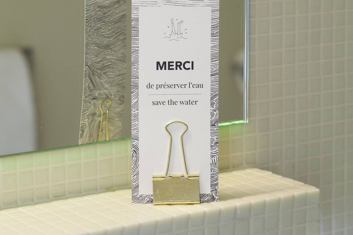 club double room | bathroom | rainfall showerhead, eco-friendly toiletries, hair dryer, bathrobes