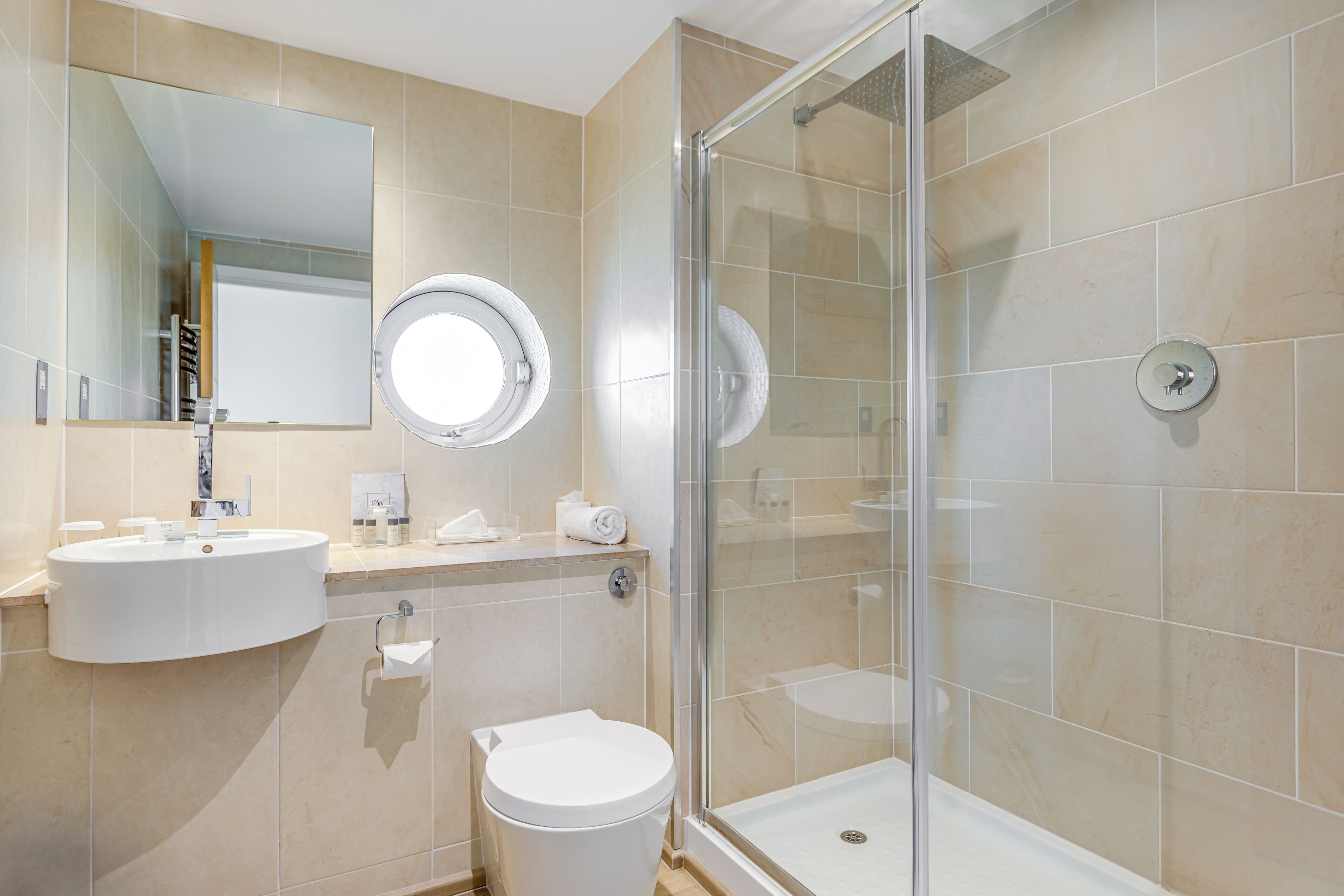 luxury suite, river view (large) | bathroom | combined shower/bathtub, free toiletries, hair dryer, bathrobes