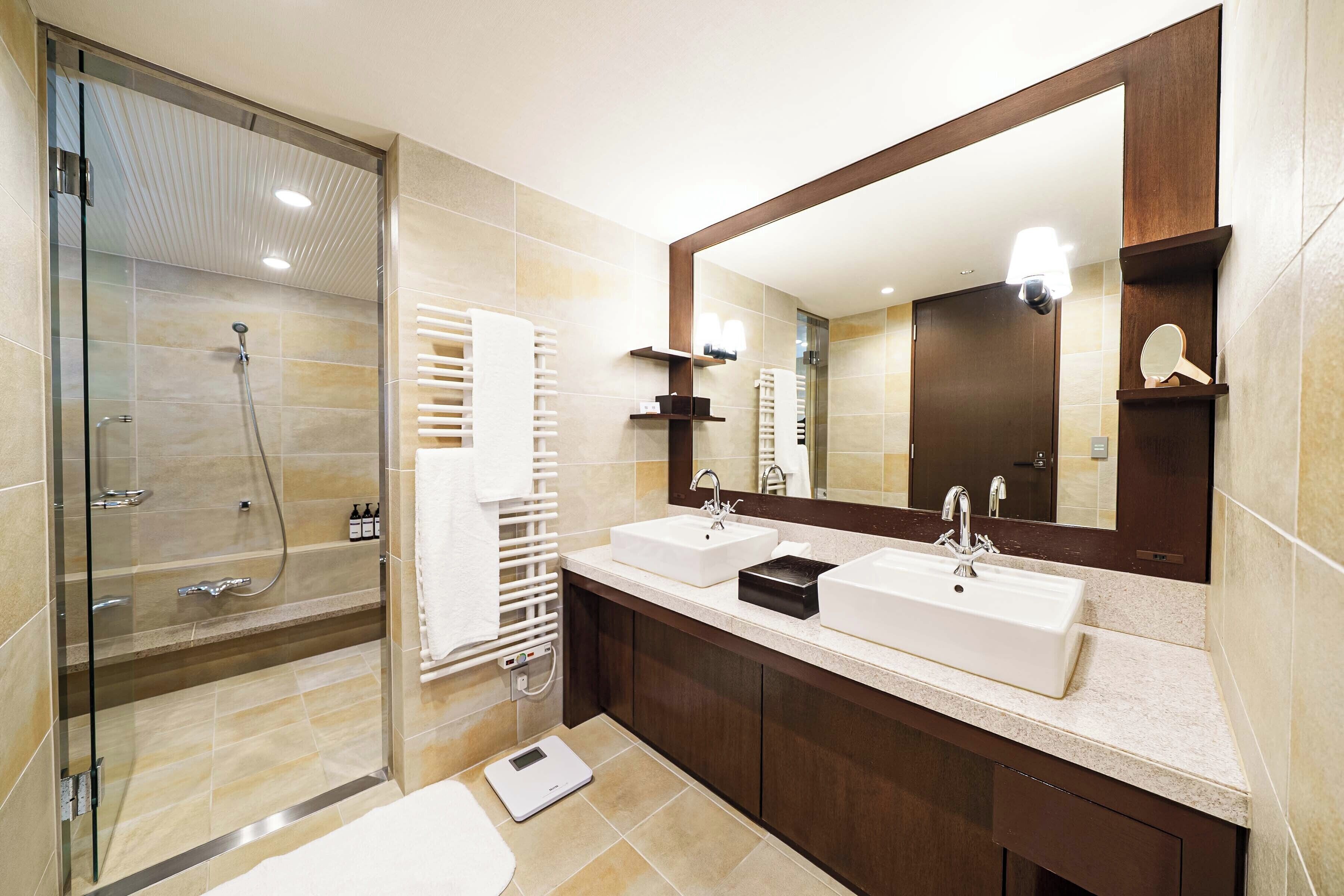 regency, executive suite | bathroom | hair dryer, slippers, electronic bidet, towels