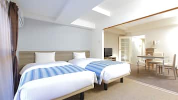 Down comforters, blackout drapes, iron/ironing board