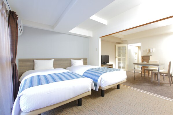 Couette en duvet d'oie, rideaux occultants, fer et planche à repasser