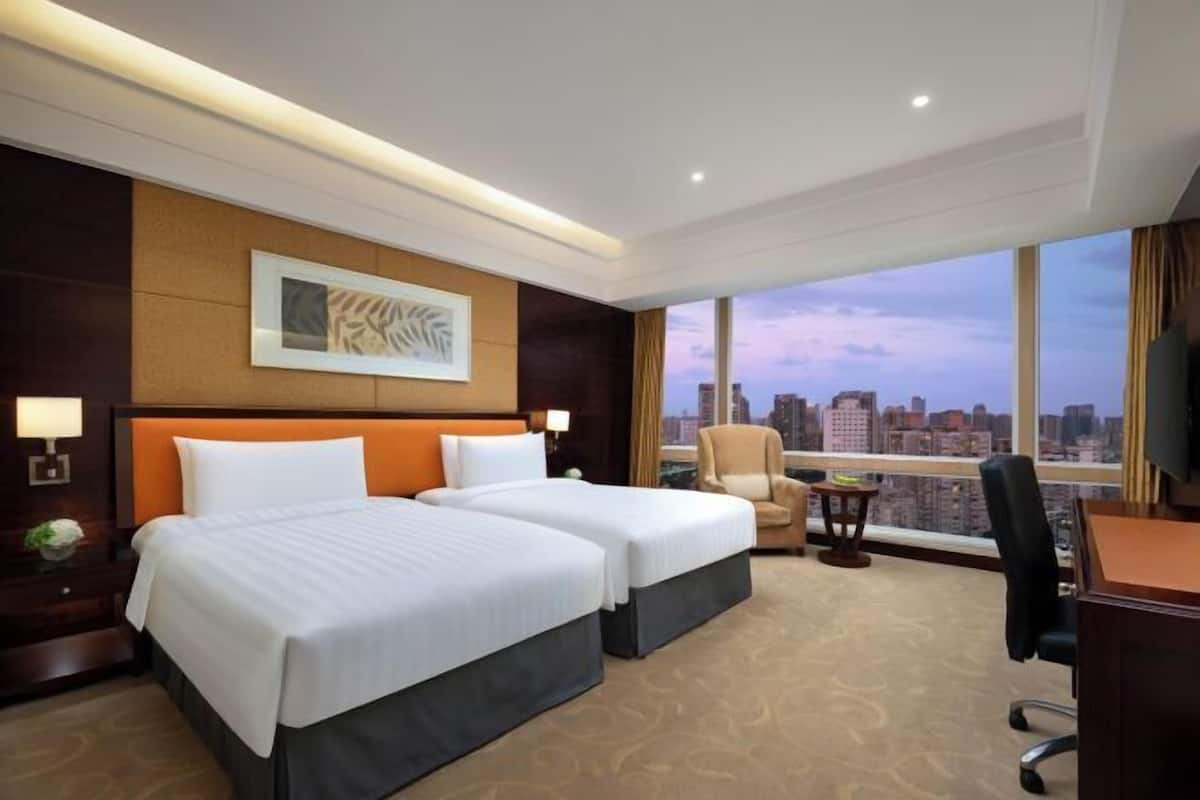 Ropa de cama de alta calidad y minibar 