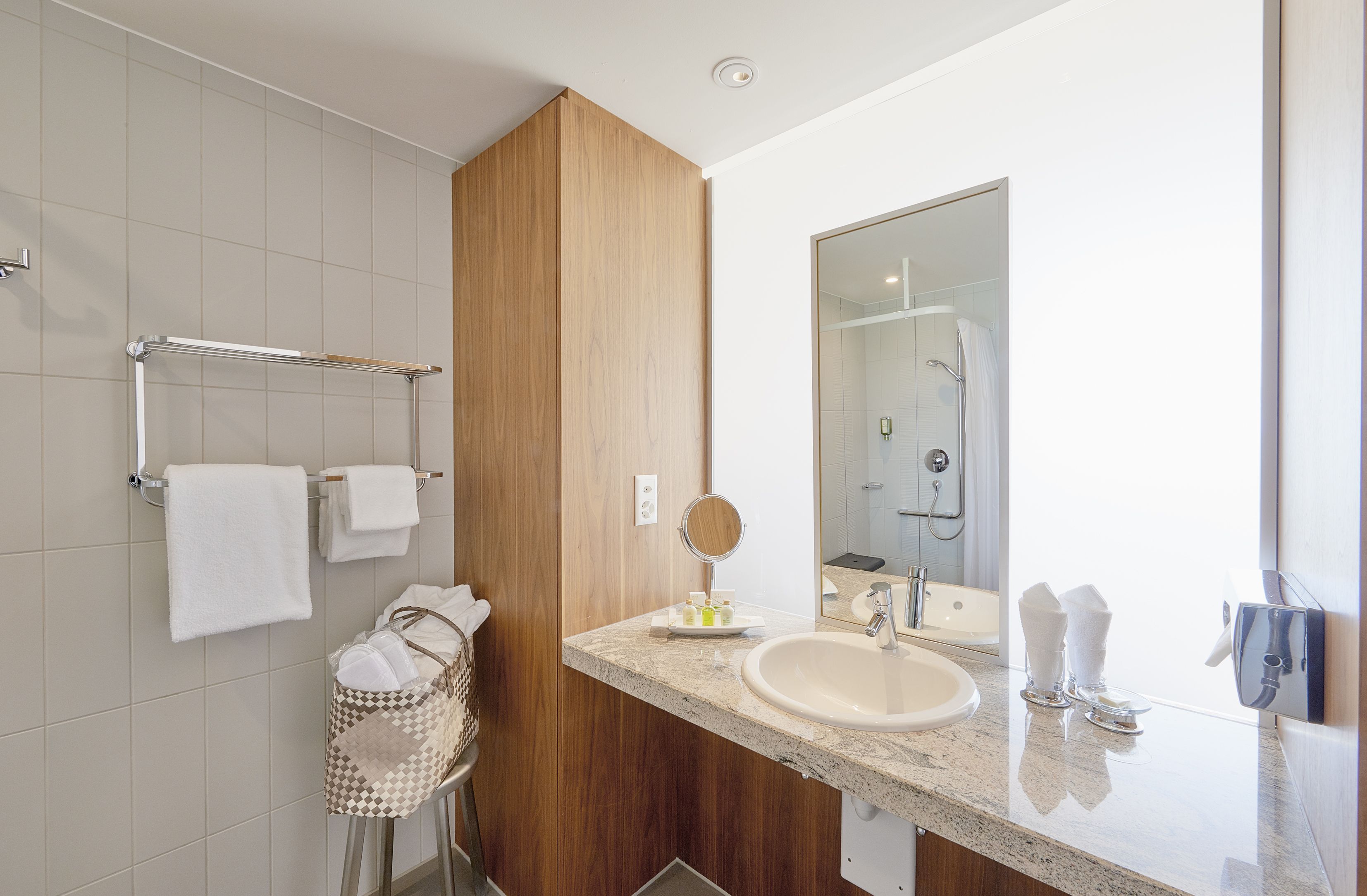 eco-friendly toiletries, hair dryer, bathrobes, slippers