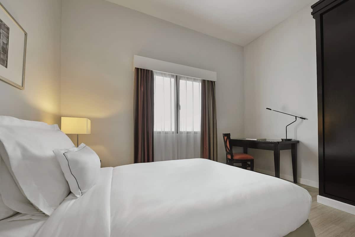 Suite, 1 Double Bed, Balcony | 1 bedroom, in-room safe, desk, blackout curtains