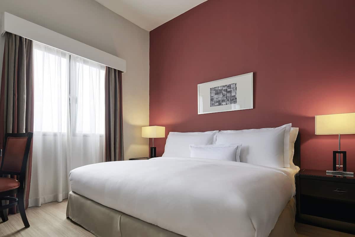 Executive Studio, 1 King Bed with Sofa bed, Balcony | In-room safe, desk, blackout drapes, iron/ironing board