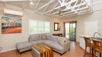 Bungalow, 3 Bedrooms | Living area | 48-inch LCD TV with cable channels, TV, iPod dock