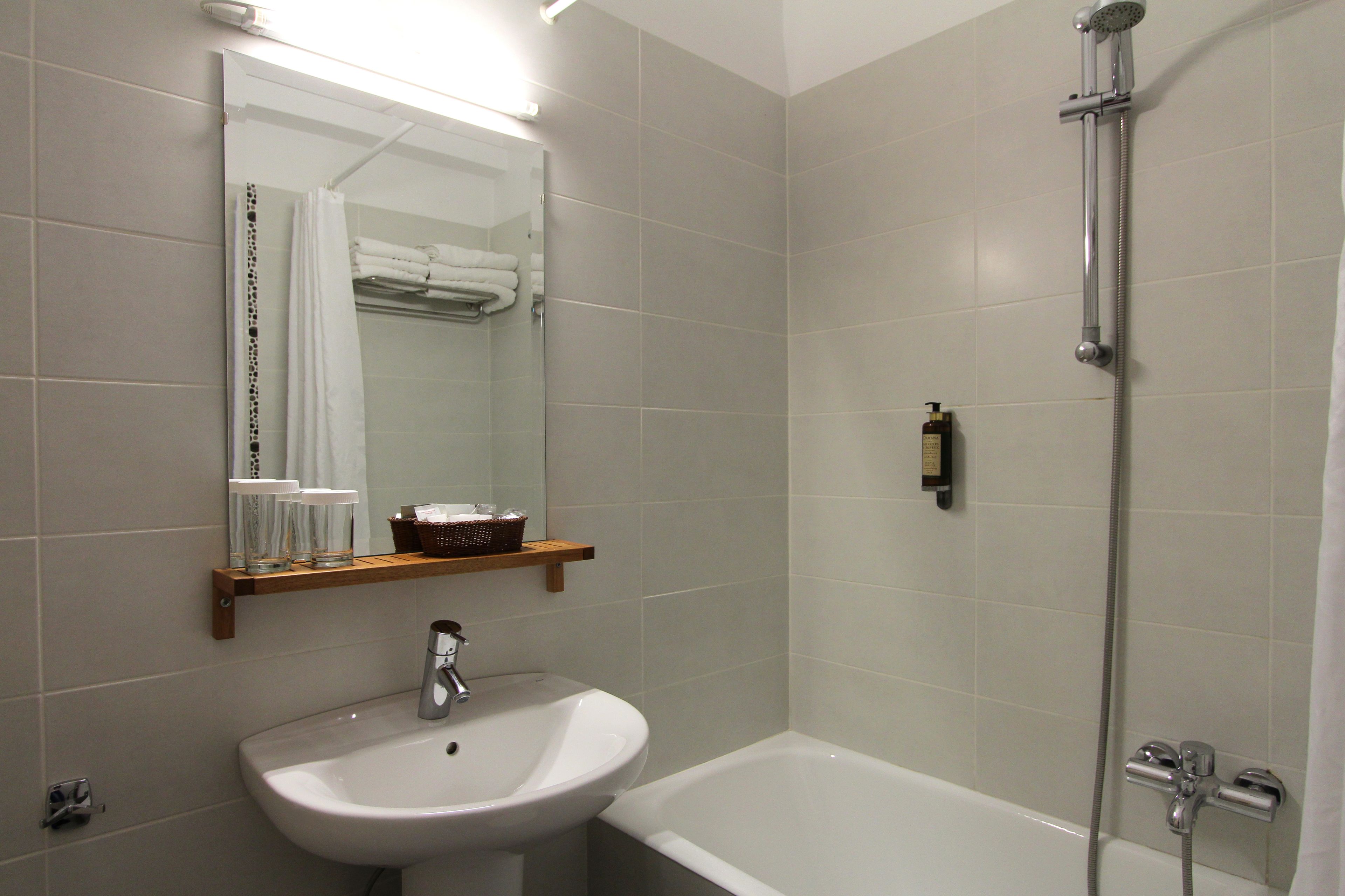 rainfall showerhead, free toiletries, hair dryer, slippers