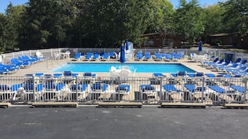 Outdoor pool, open 10:00 AM to 10:00 PM, pool loungers