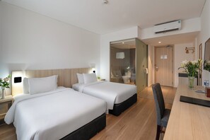 Quarto panorâmico, vista para a cidade (Executive Deluxe) | Camas com colchões pillow-top, frigobar, cofres nos quartos