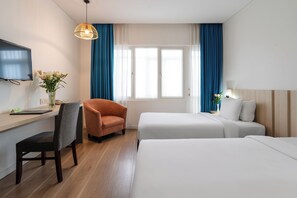 Quarto panorâmico, vista para a cidade (Executive Deluxe) | Camas com colchões pillow-top, frigobar, cofres nos quartos