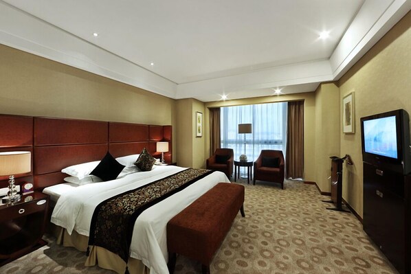 Ropa de cama de alta calidad y minibar