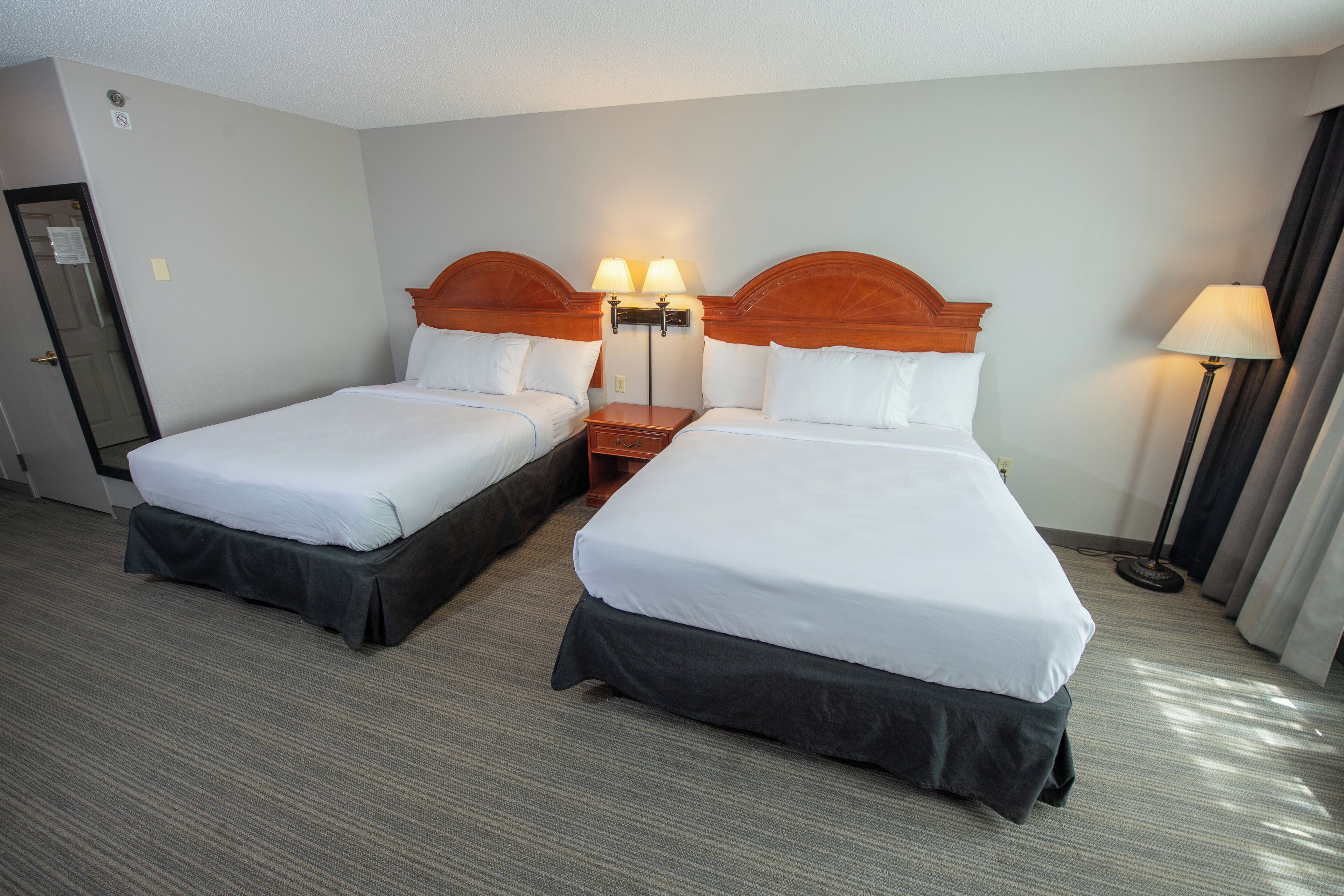 premium bedding, desk, blackout curtains, soundproofing