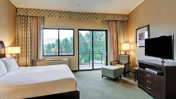Hypo-allergenic bedding, desk, laptop workspace, blackout curtains