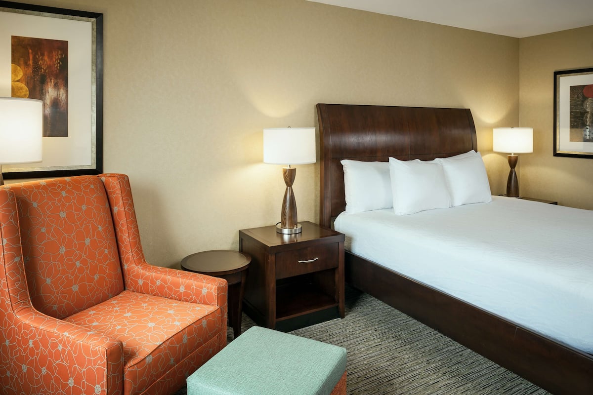 Hypo-allergenic bedding, desk, laptop workspace, blackout curtains