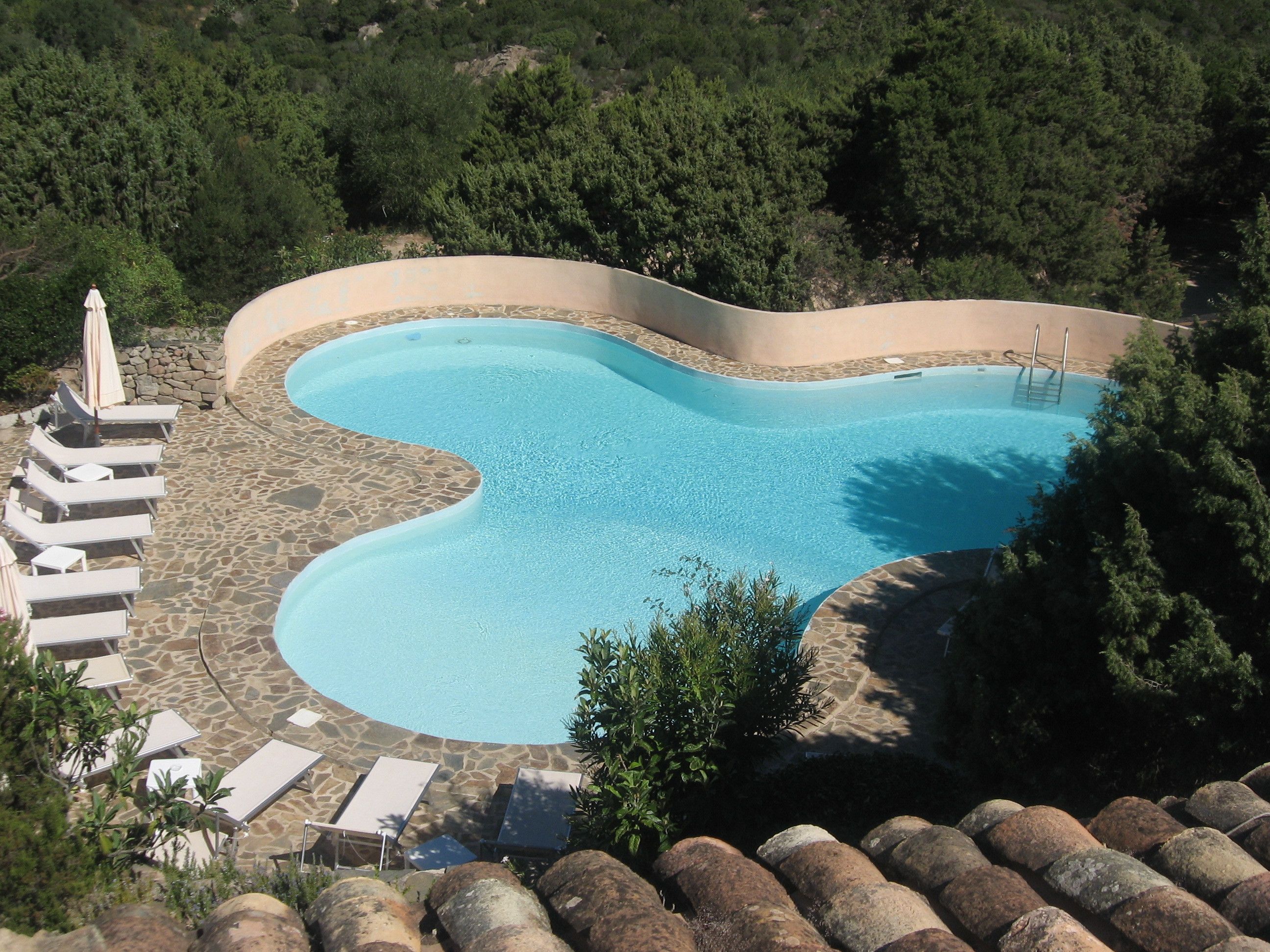 outdoor pool, pool umbrellas, pool loungers