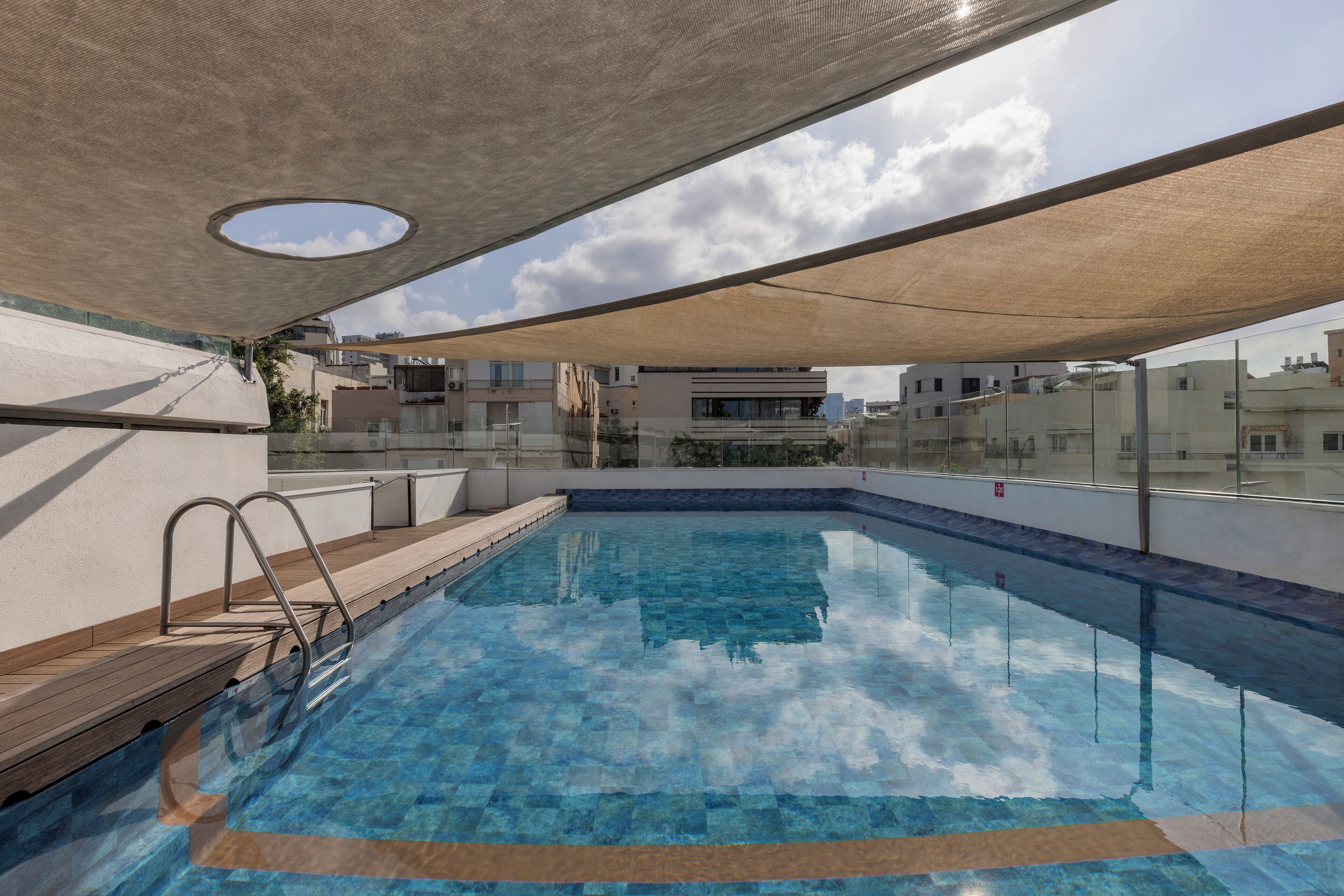 Seasonal outdoor pool, open 10 AM to 6 PM, pool umbrellas, sun loungers