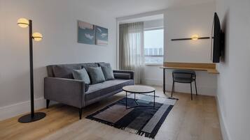 Suite superior | Minibar, caja de seguridad en la habitación y escritorio