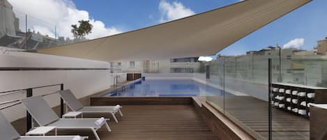 Seasonal outdoor pool, open 10 AM to 6 PM, pool umbrellas, sun loungers