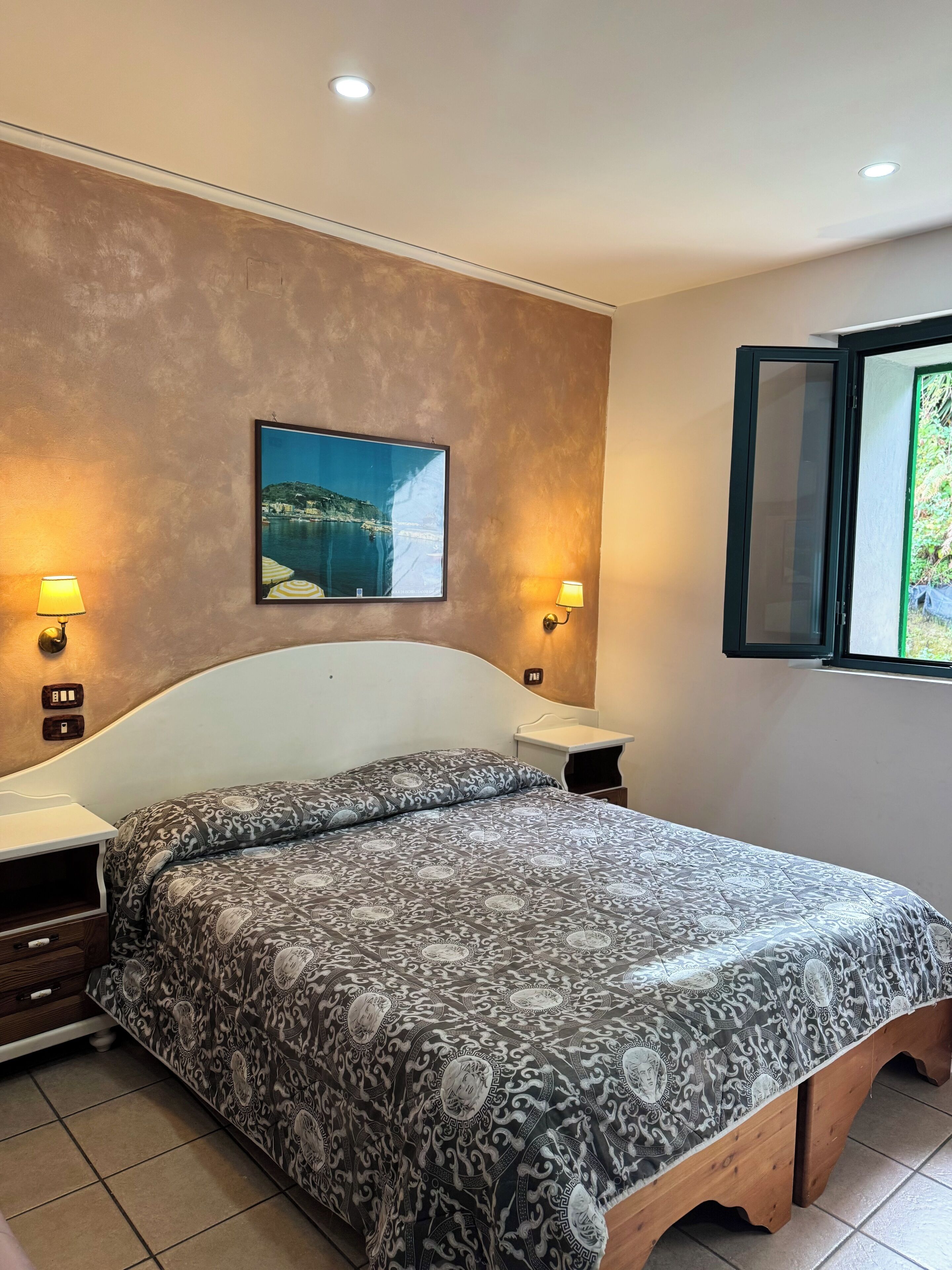 Desk, blackout curtains, free cots/infant beds, free WiFi