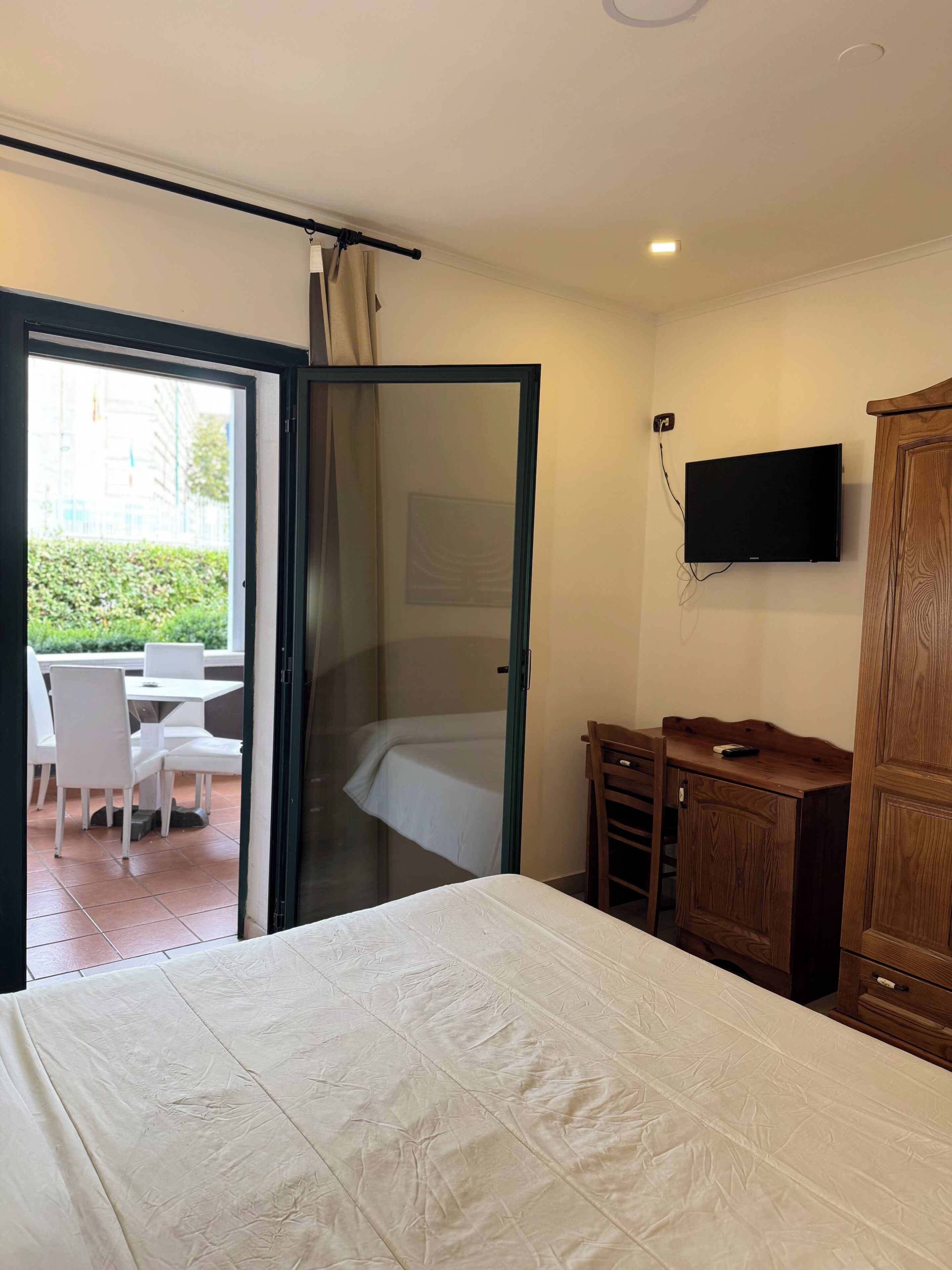 Desk, blackout curtains, free cots/infant beds, free WiFi