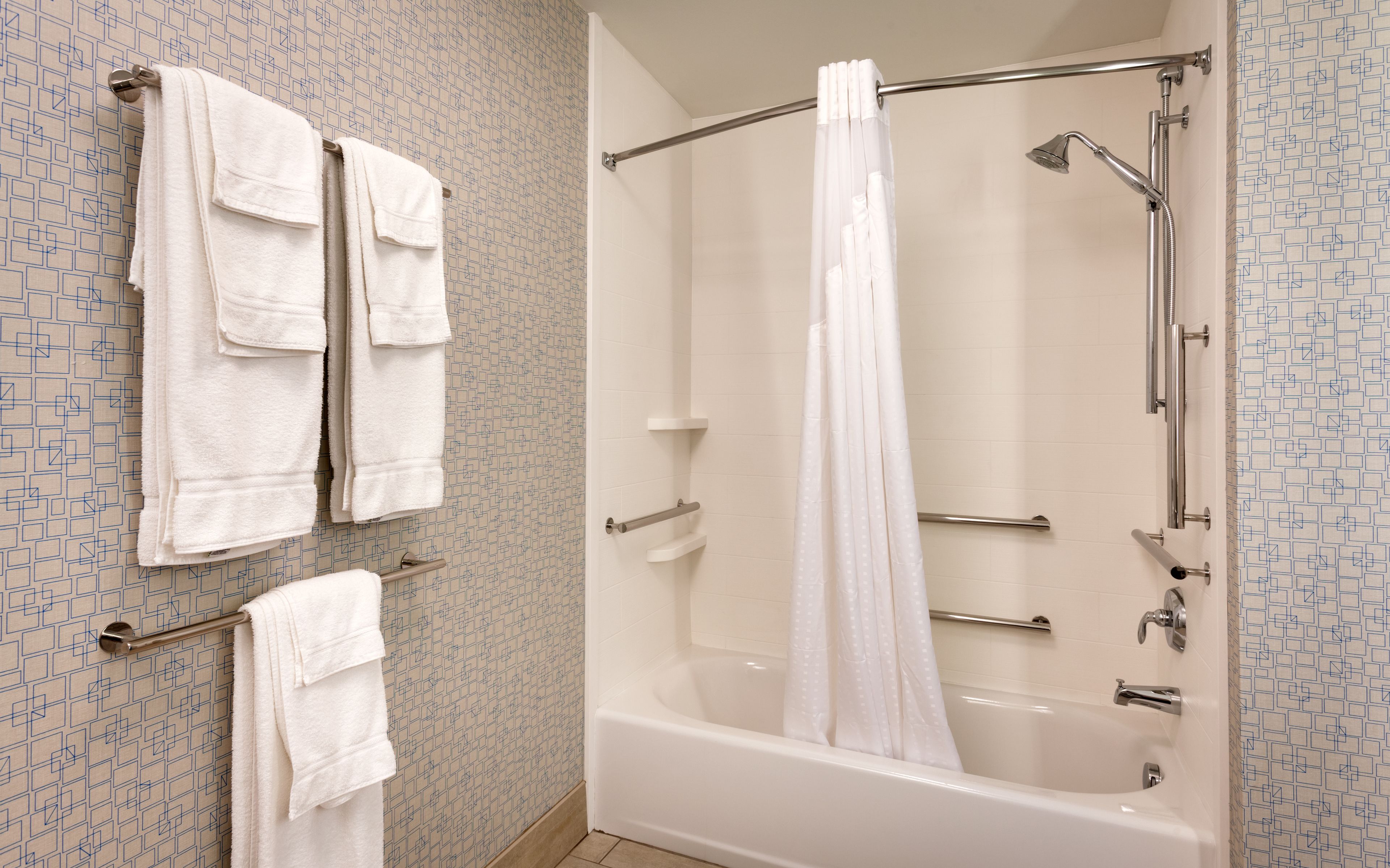 standard room, 2 queen beds | bathroom | free toiletries, hair dryer, towels