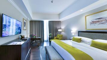 Chambre Double Exécutive, 1 trÚs grand lit | Literie de qualité supérieure, coffres-forts dans les chambres, bureau