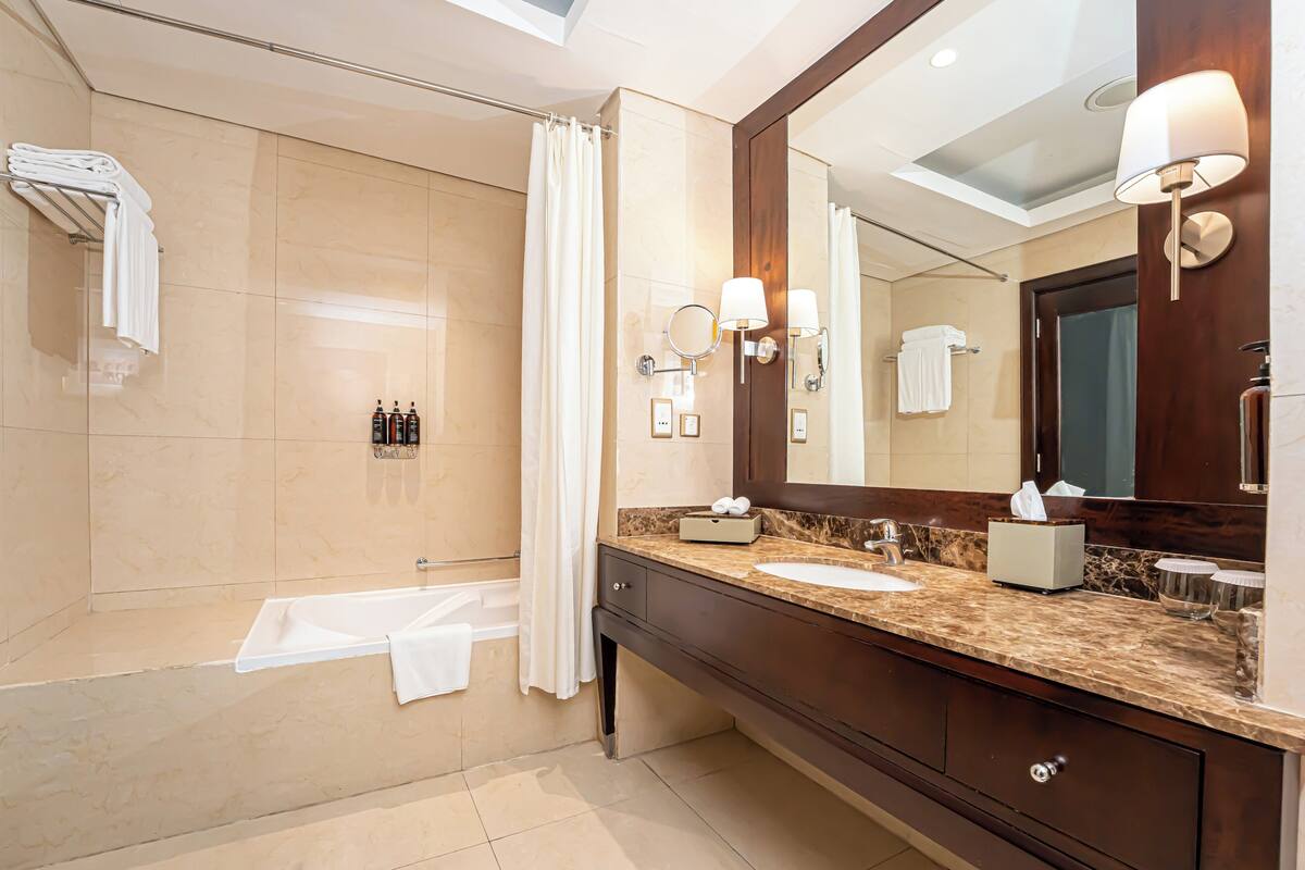 eco-friendly toiletries, hair dryer, bathrobes, slippers