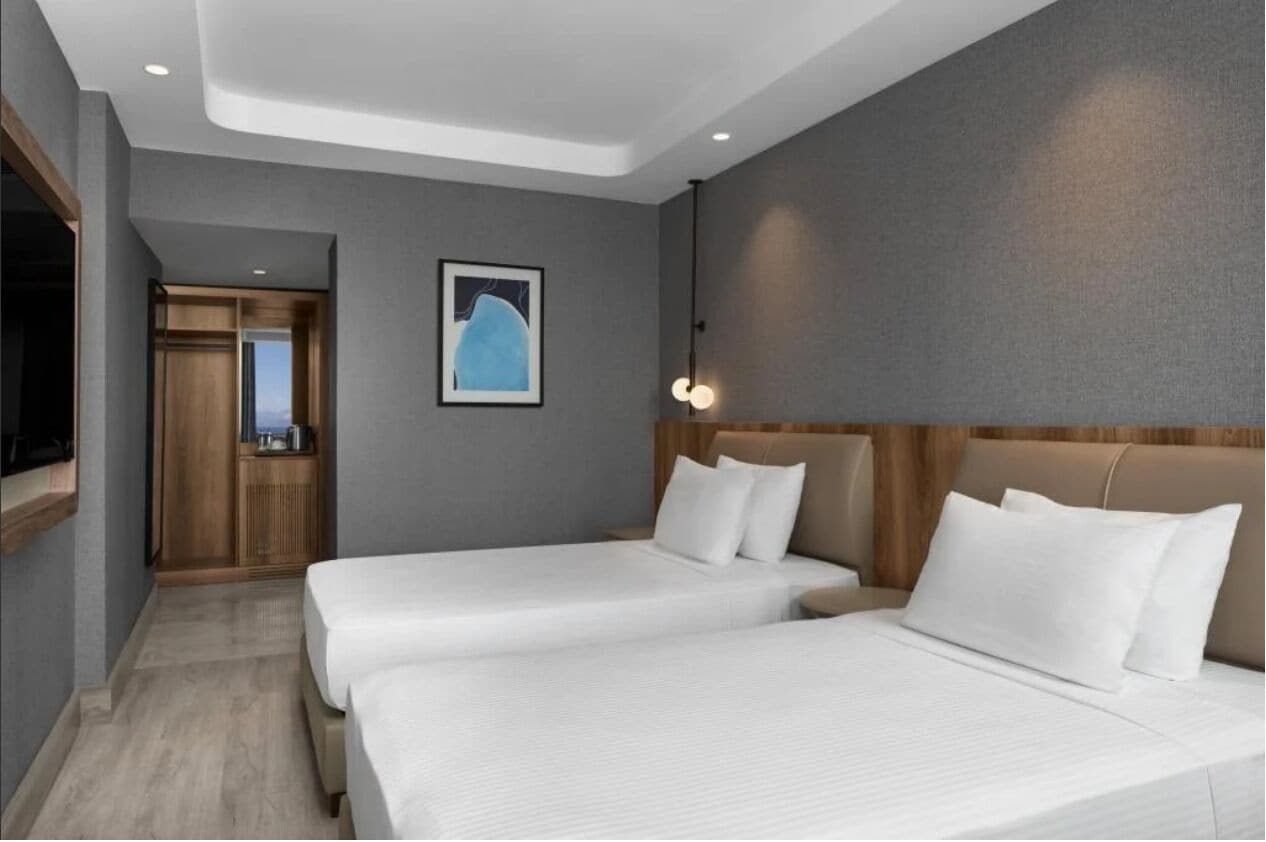 Standard Room, 2 Twin Beds, Partial Sea View | Premium bedding, free minibar, in-room safe, individually decorated