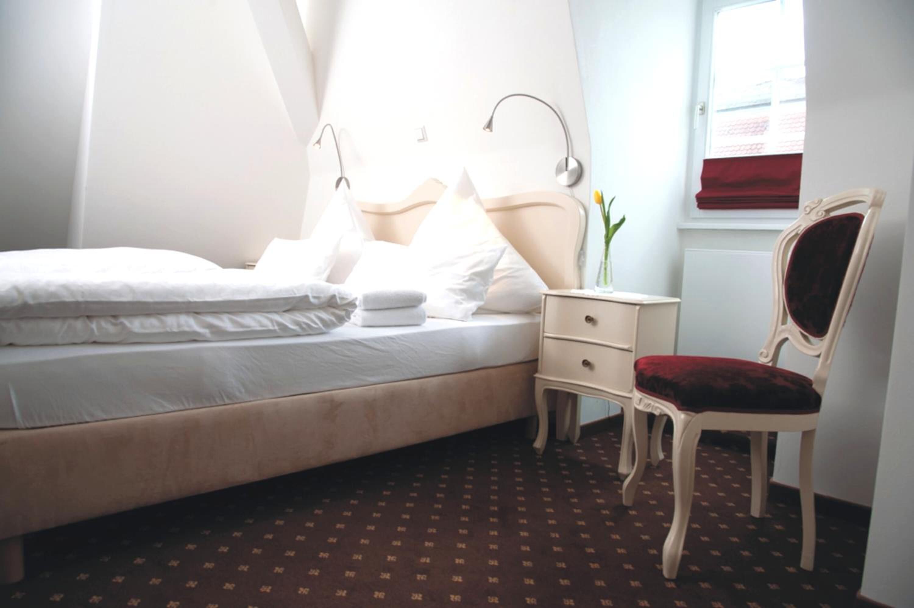 hypo-allergenic bedding, desk, blackout curtains, free wifi