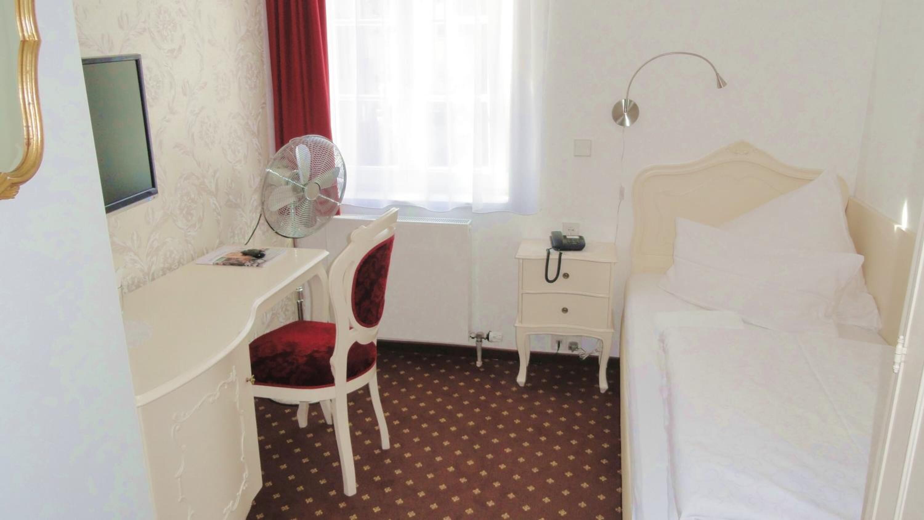 hypo-allergenic bedding, desk, blackout curtains, free wifi