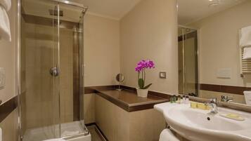 Shower, free toiletries, hair dryer, slippers