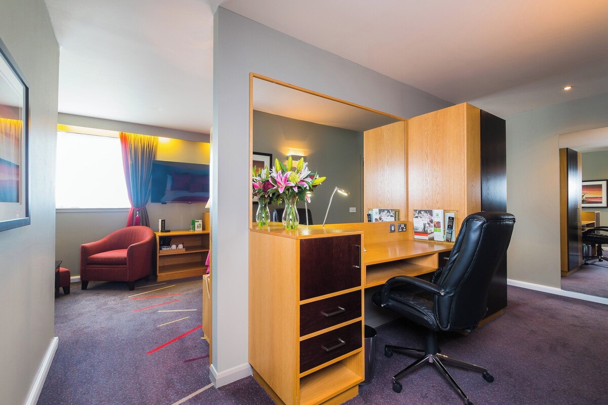 Suite, 1 King Bed with Sofa bed | 1 bedroom, in-room safe, desk, blackout drapes