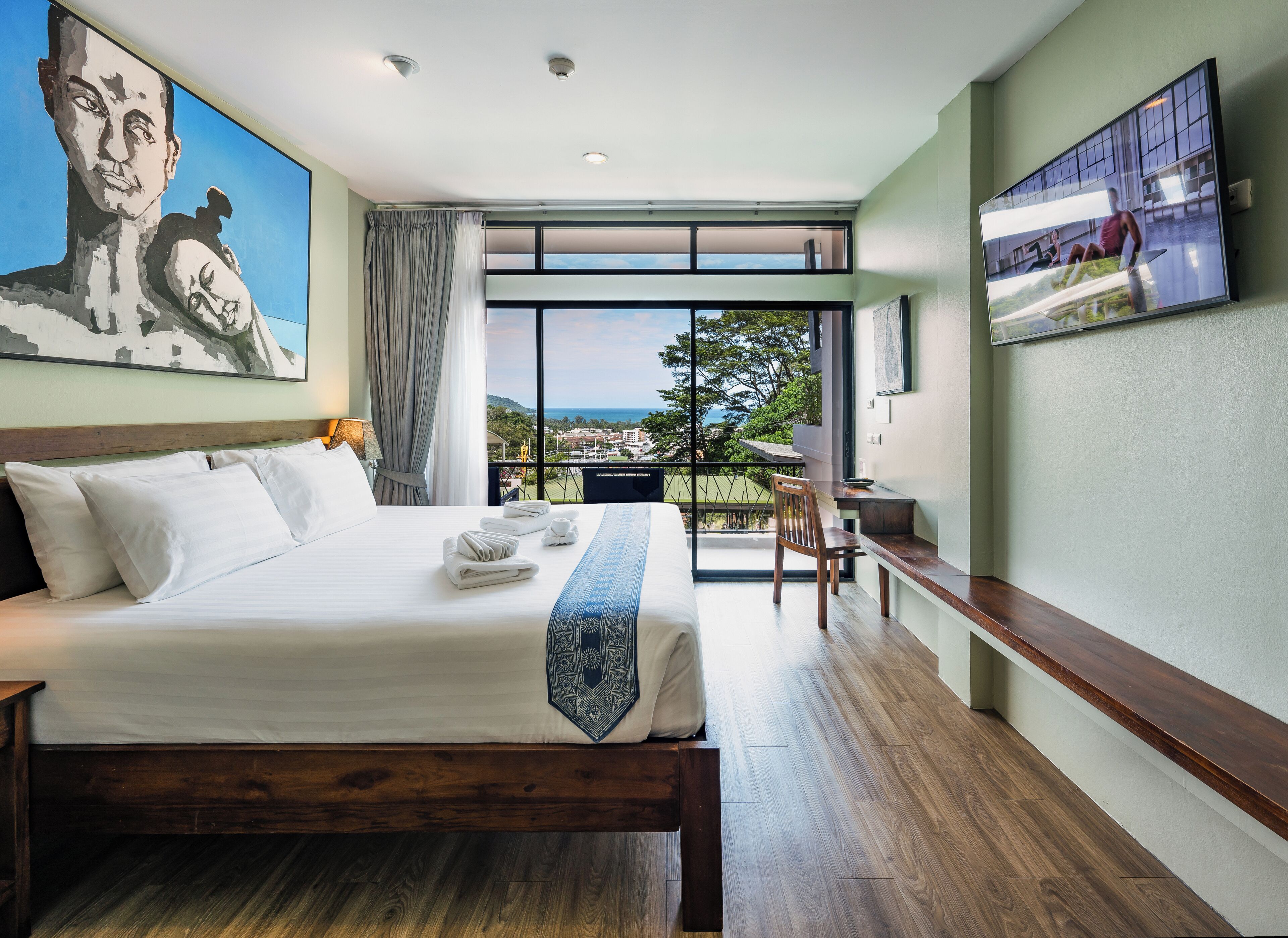 deluxe double room, ocean view | 1 bedroom, minibar, in-room safe, desk