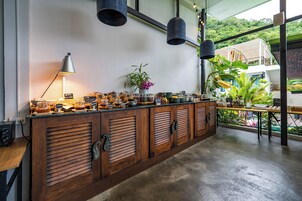 Breakfast, lunch, dinner served; Thai cuisine, pool views 