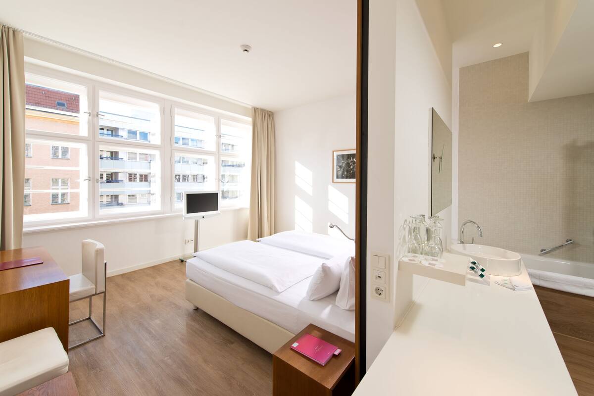 Hypo-allergenic bedding available, minibar, in-room safe