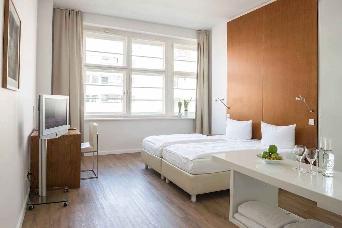Hypo-allergenic bedding available, minibar, in-room safe