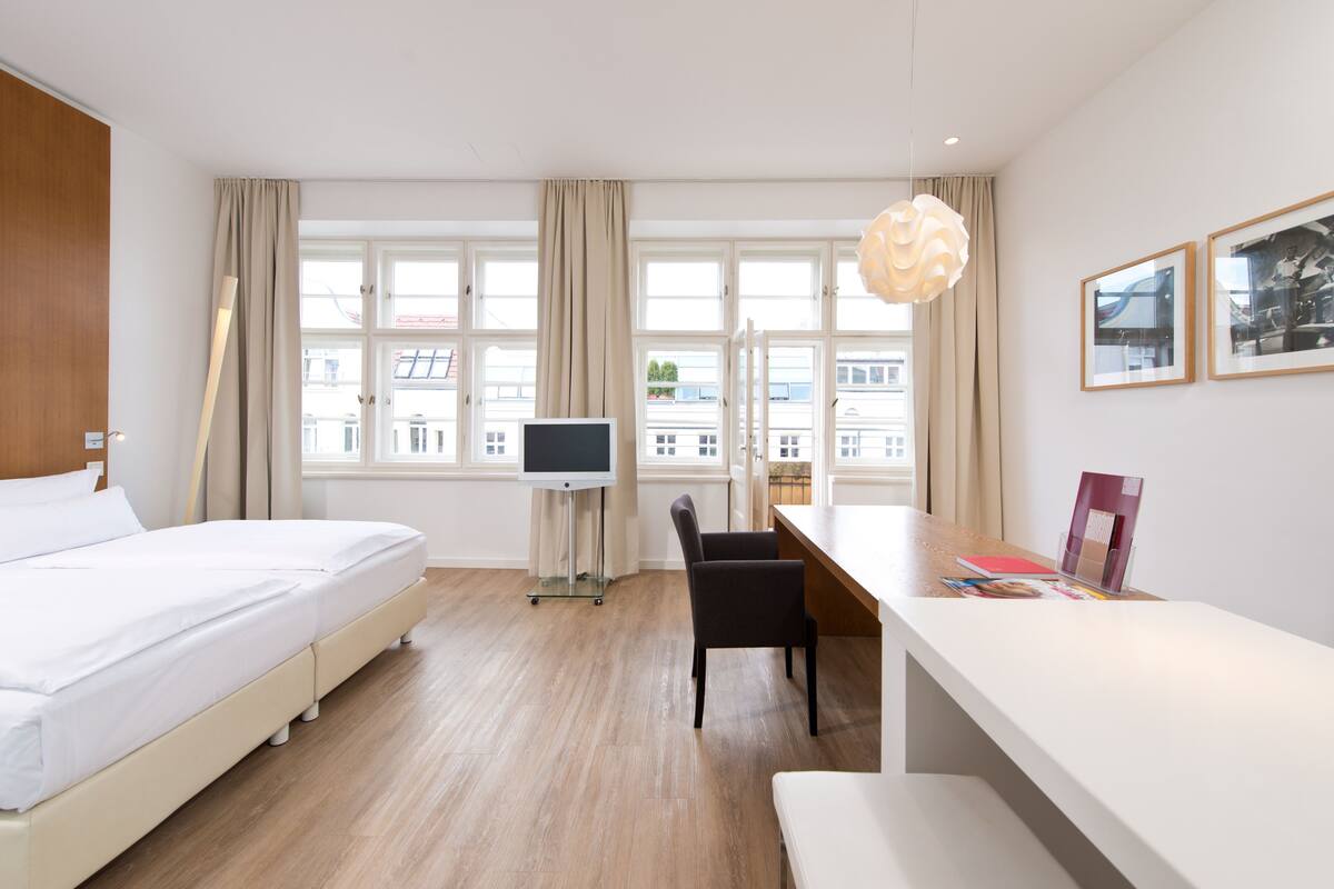 Hypo-allergenic bedding available, minibar, in-room safe