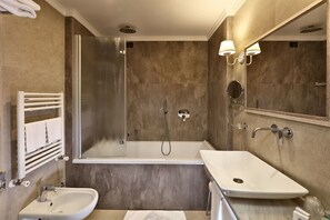 Deluxe Double Room | Bathroom | Designer toiletries, hair dryer, bathrobes, slippers