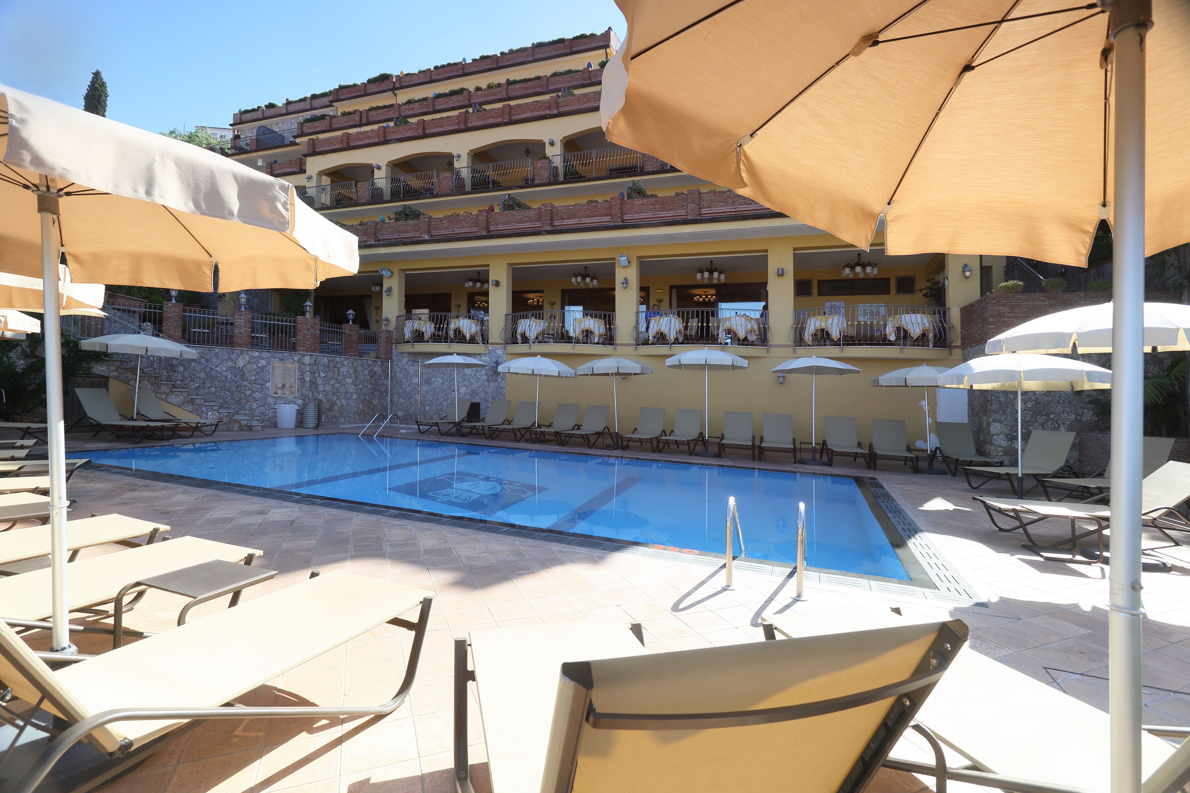 outdoor pool, pool loungers