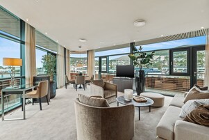 Suite, 1 Double Bed, Non Smoking | Living area | Flat-screen TV, pay movies, heated floors