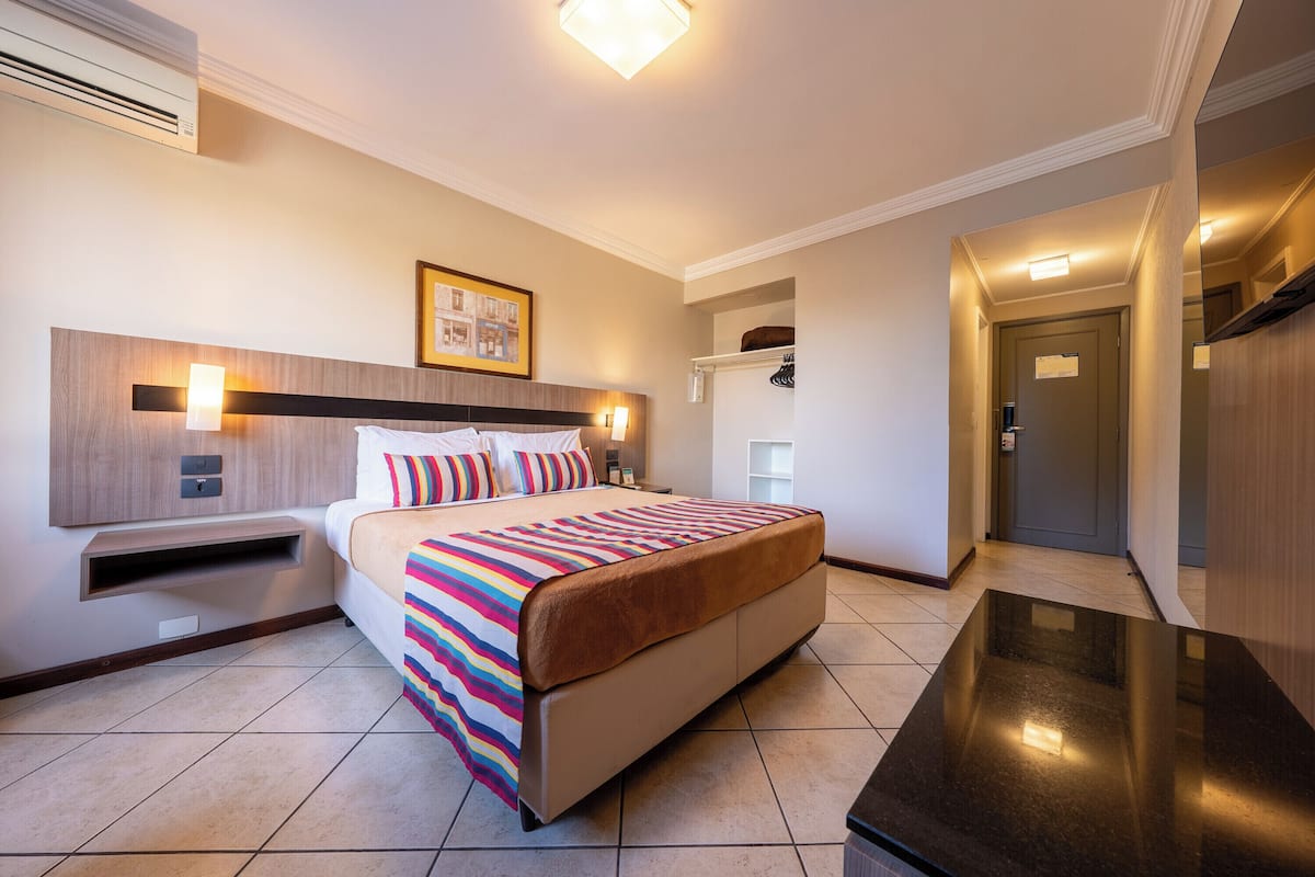 Superior Double Room | Minibar, in-room safe, desk, laptop workspace