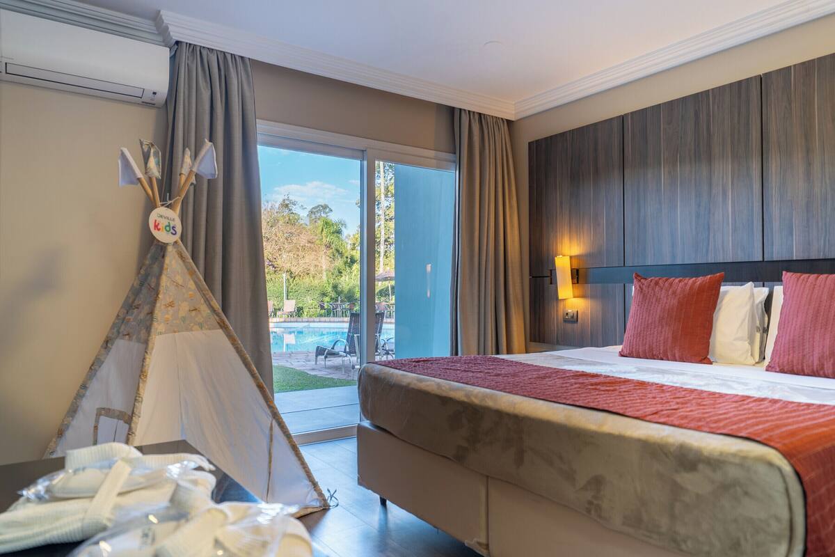 Deluxe Double Room | Minibar, in-room safe, desk, laptop workspace